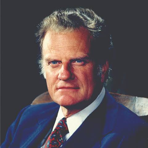 Billy Graham preaching during one of his international evangelistic crusades.