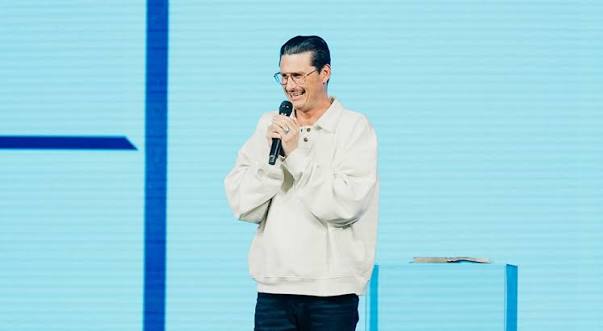 Pastor Chad Veach preaching during a worship service at ZOE Church in Los Angeles.