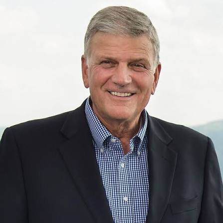 Franklin Graham preaching during an international evangelistic event.
