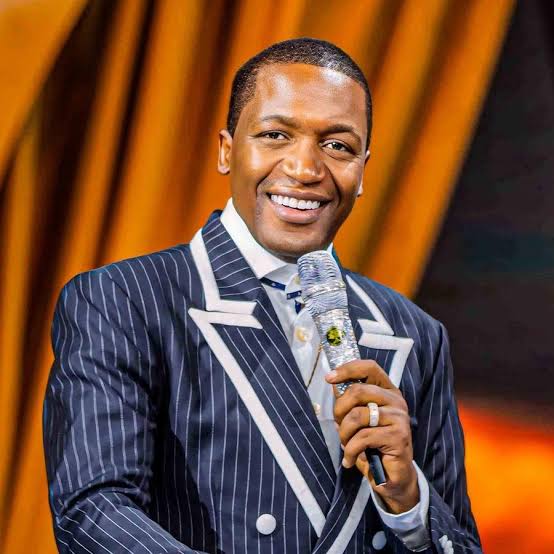 Uebert Angel preaching during a Christian ministry service